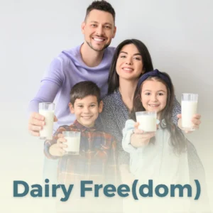 A happy family holding milk glasses with some text saying dairy freedom overlaid over them